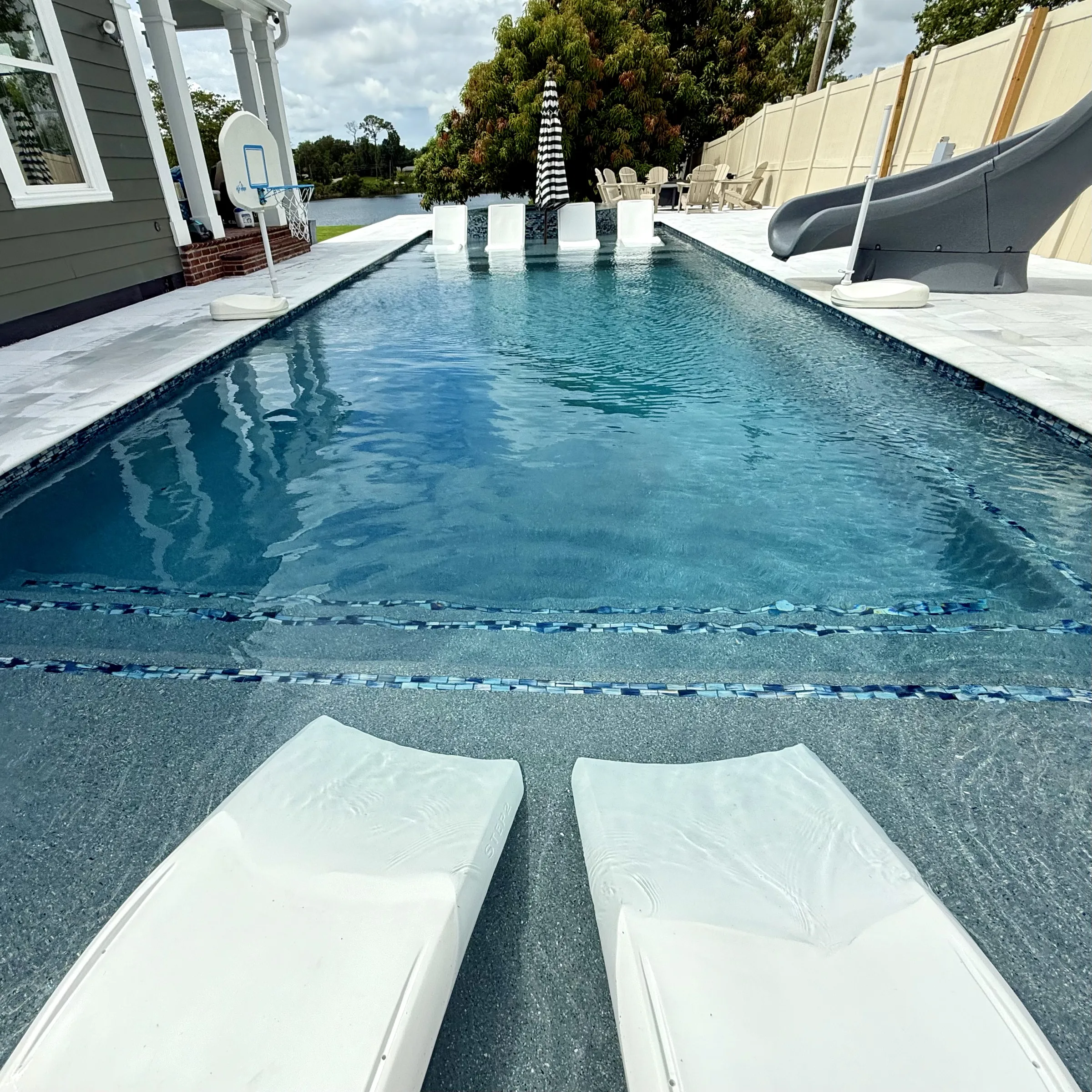 Berry House swimming pool and poolside loungers